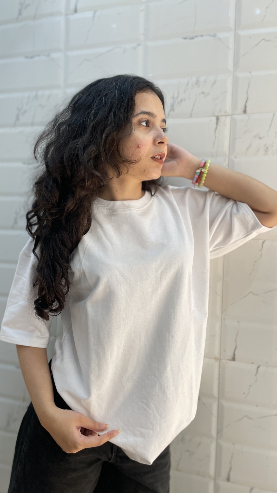 Woman wearing oversized White t shirt by TheCottonStrand