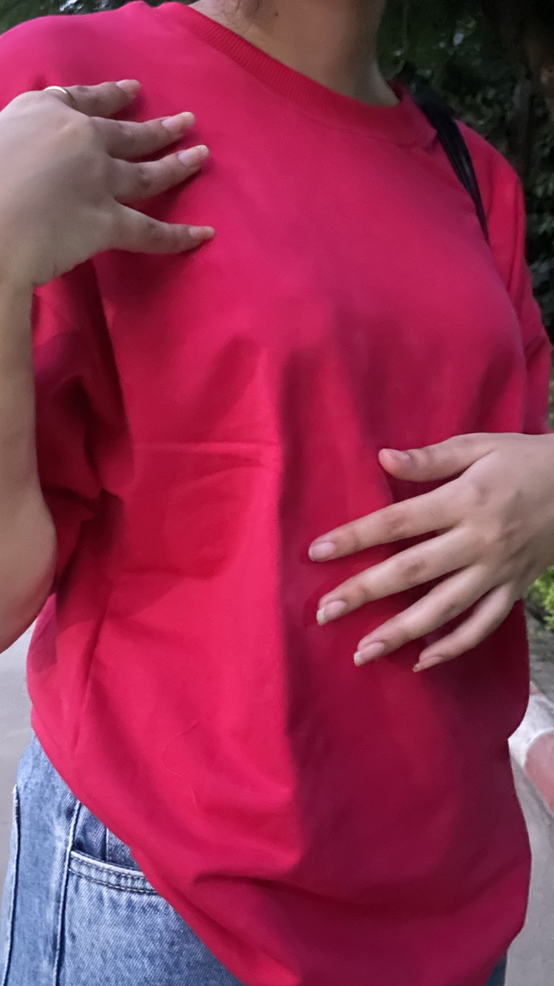 Woman wearing oversized Pink t shirt by TheCottonStrand