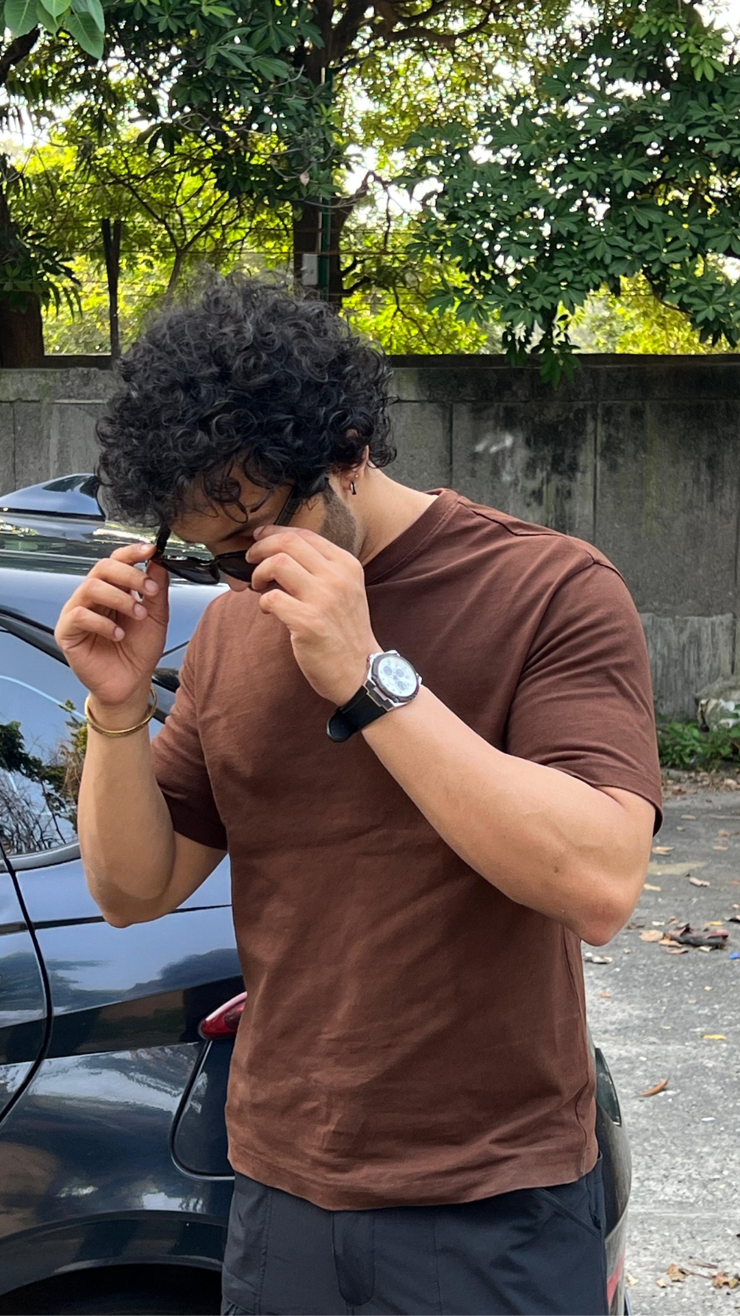 Man wearing oversized brown t shirt by TheCottonStrand