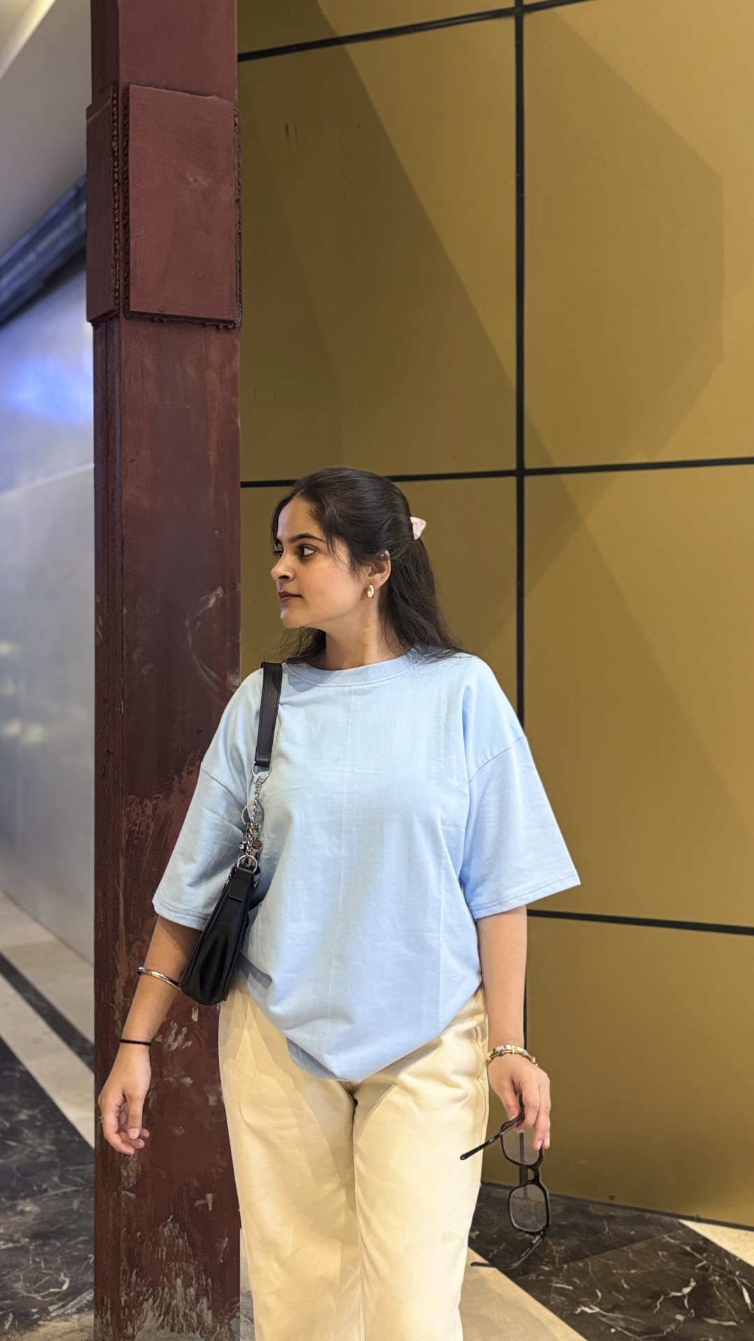 Woman wearing oversized blue t shirt by TheCottonStrand