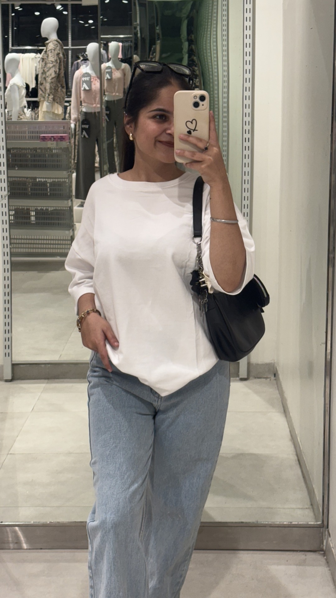 Woman wearing oversized White t shirt by TheCottonStrand
