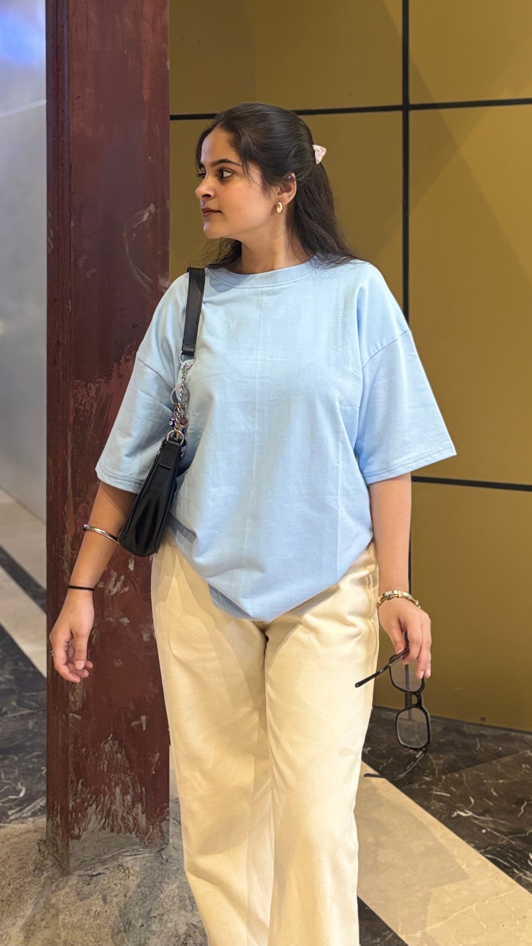 Woman wearing oversized blue t shirt by TheCottonStrand