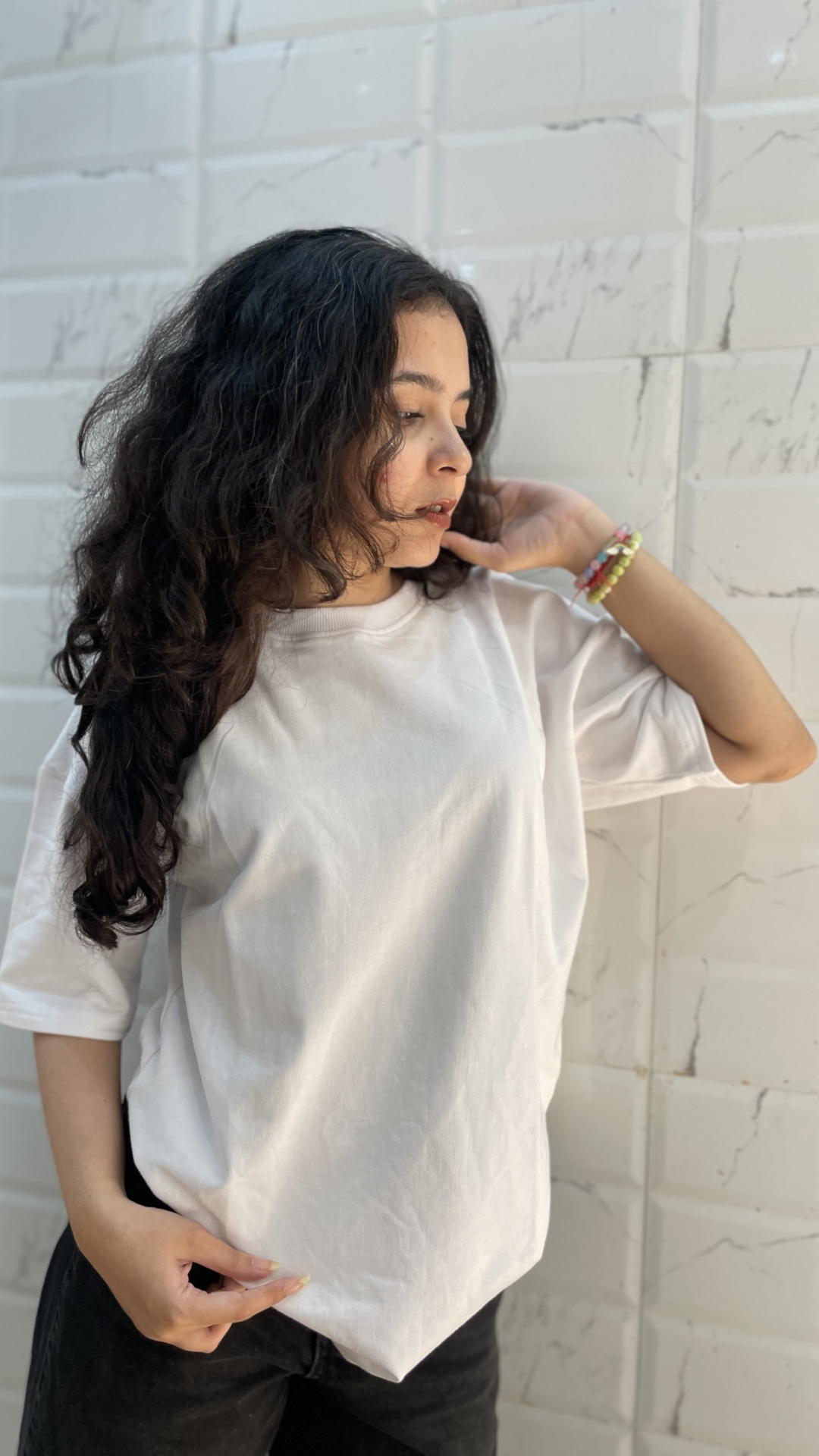 Woman wearing oversized White t shirt by TheCottonStrand