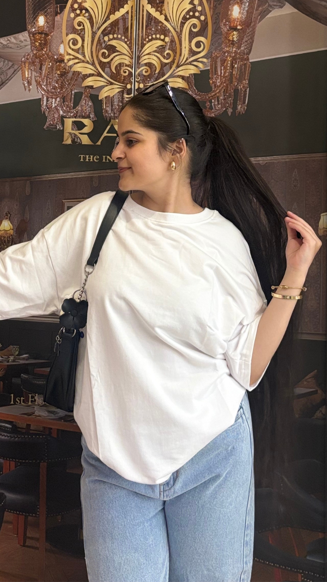 Woman wearing oversized White t shirt by TheCottonStrand
