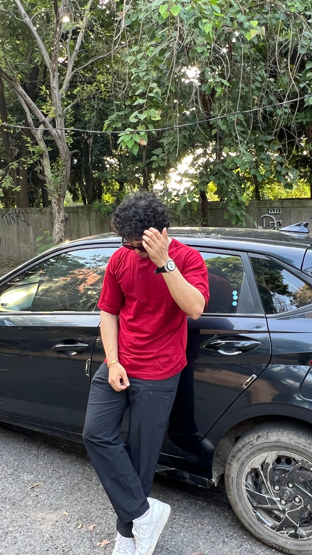 man wearing oversized Red t shirt by TheCottonStrand