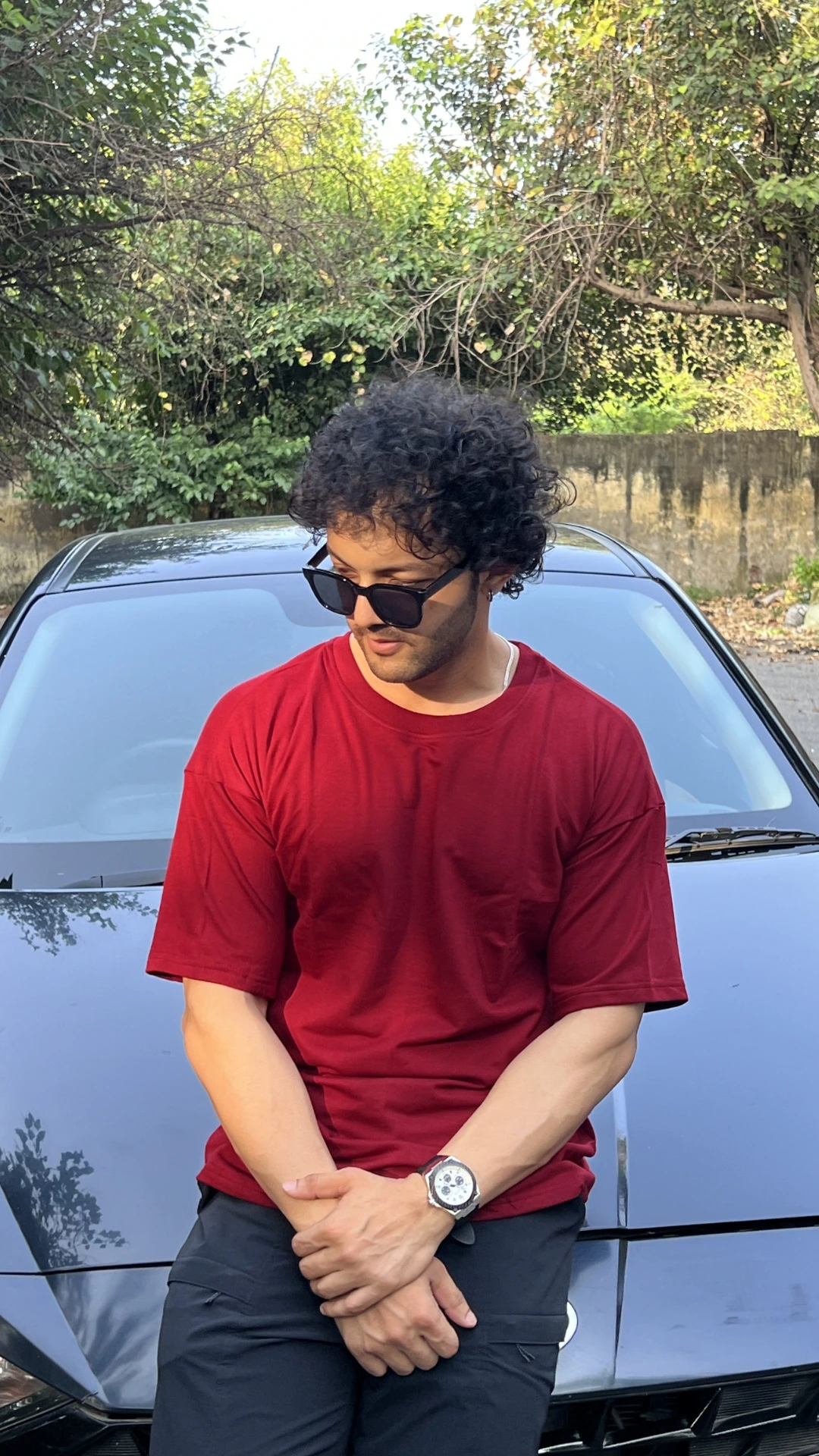 man wearing oversized Red t shirt by TheCottonStrand